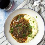 For easy comfort food in the instant pot, make sweet and spicy pressure cooker short ribs braised in red wine with figs and chipotle. Serve over mashed potatoes or with some crusty bread for the sauce. | justalittlebitofbacon.com #comfortfood #shortribs #beefshortribs #pressurecookerrecipe #instantpotrecipe #winterrecipe