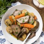 My Italian-style pressure cooker pot roast is braised in red wine until the meat just falls apart and the potatoes and carrots are tender. Easy instant pot comfort food dinner! | justalittlebitofbacon.com #italianrecipes #dinnerrecipes #comfortfood #pressurecooker #instantpot #potroast