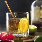 Fall, winter, spring, or summer, you'll love sipping a simple maple lime bourbon sour! This drink is the perfect balance of sweet and sour combined with smooth whiskey to make a refreshing cocktail. | justalittlebitofbacon.com #cocktailrecipes #drinkrecipes #drinks #bourbon #cockails