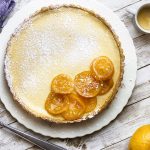 For a delicious sweet Easter dessert, you'll love this Italian ricotta pie! Baked in a tart shell, flavored with lemon, creamy and rich, and easy to make.Perfect for the holidays. | justalittlebitofbacon.com #italianrecipes #italianfood #dessertrecipes #pierecipes #pies #tarts #ricotta #dessert