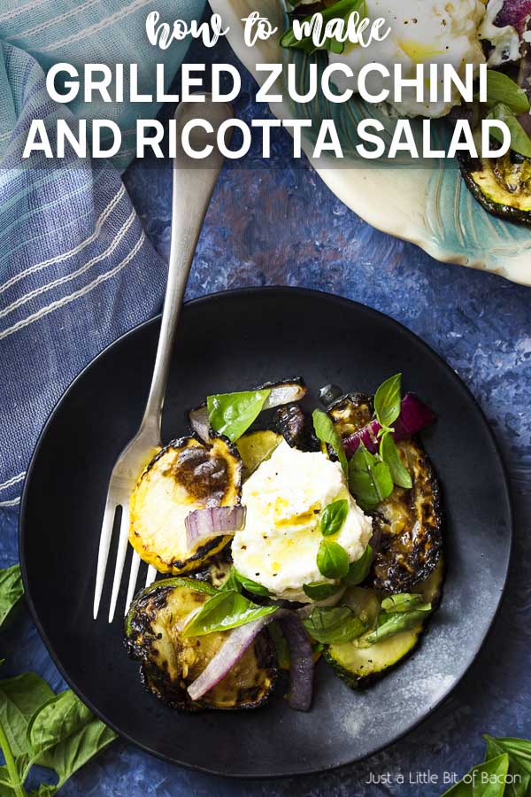 For an easy side make grilled zucchini salad with lemon ricotta! This Mediterranean recipe is delicious warm or room temperature and is wonderful with a mix of green and yellow summer squash. | justalittlebitofbacon.com #italianfood #summerrecipes #saladrecipes #salads #grillingrecipes #zucchini #ricotta Grilled squash and cheese on a black plate with text overlay Grilled Zucchini and Ricotta Salad.