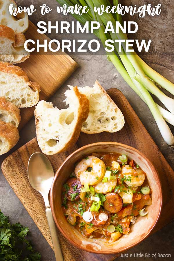 Table with bowl of stew and bread and text overlay - Shrimp and Chorizo Stew.