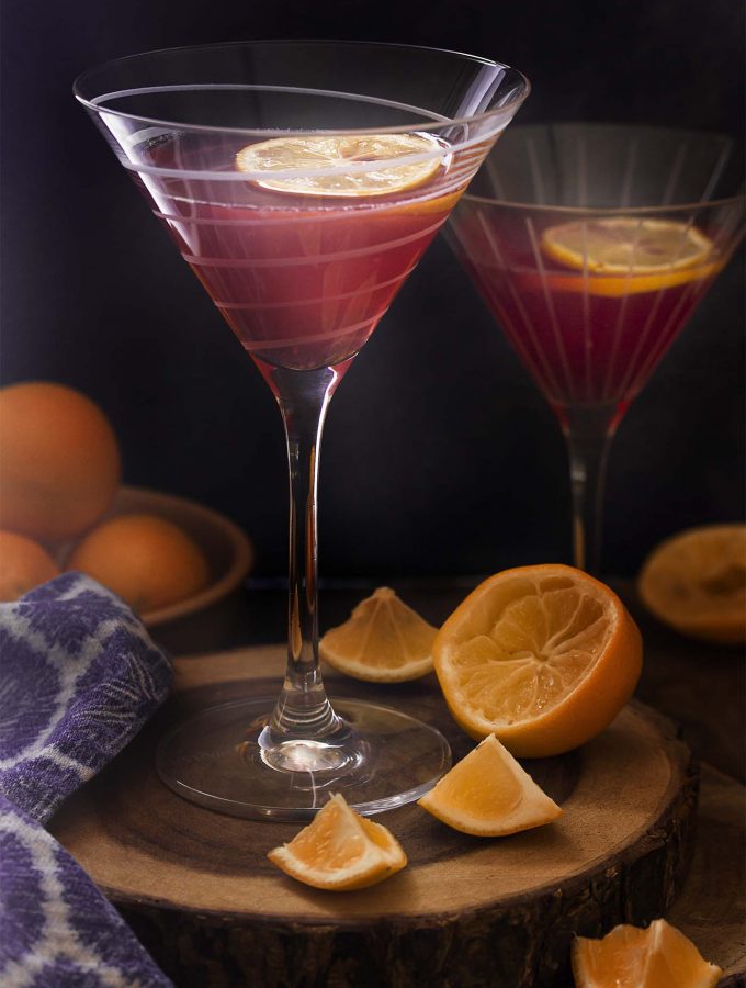 For a fun cosmo drink twist try this meyer lemon cosmopolitan cocktail! Great flavor, easy to make, and just a few ingredients. Make a glass or a pitcher. | justalittlebitofbacon.com #cocktailrecipes #cosmopolitan #drinkrecipes #cocktails #drinks #meyerlemons