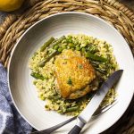 Use only a skillet in my one pot chicken and orzo dinner! Juicy thighs, pasta, and plenty of vegetables in this easy, weeknight meal. | justalittlebitofbacon.com