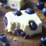 Creamy, smooth, and tangy from the sour cream, these blueberry cheesecake bars with a graham cracker crust are a delicious and simple way to satisfy your cravings. No water baths, no fuss. | justalittlebitofbacon.com