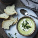 Smooth and creamy cold asparagus bisque is a recipe you'll want to make all year long! This classic French soup is easy to make, takes only a handful of ingredients, and comes together quickly. Perfect as a first course or as a vegetarian main. | justalittlebitofbacon.com